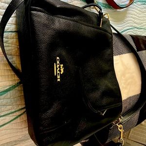 Very clean coach purse.  Blk leather with front zip pocket.  Very nice.